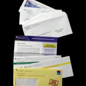 marketing envelopes for an association stacked up on a graphic background